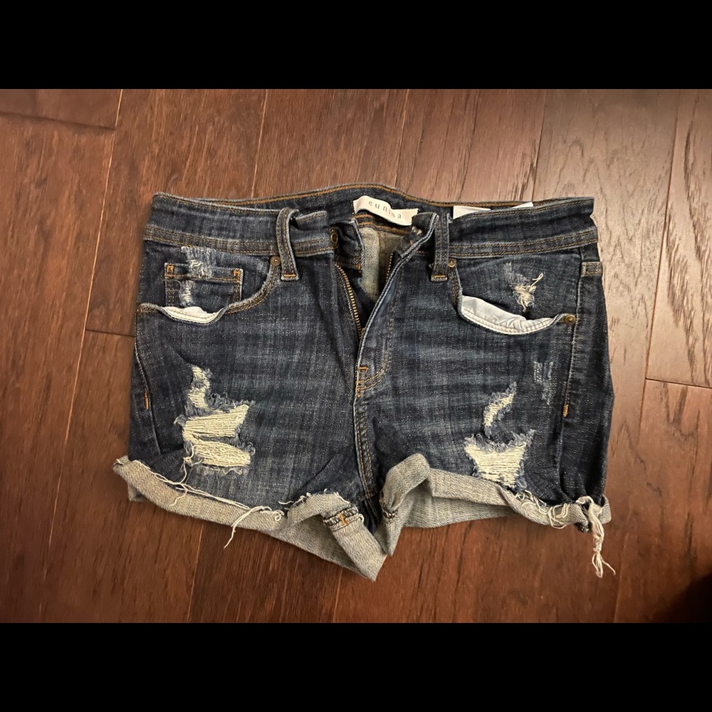 Worn once, low rise ripped shorts
